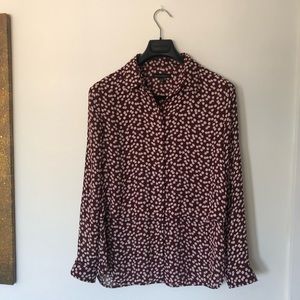 Woman’s button-down blouse.